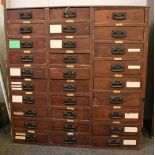 A Victorian grained pine seed merchant's cabinet, with 29 drawers, 97cm wide, 53cm deep, 100cm
