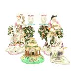 A pair of late 18th century Derby porcelain figures, modelled as a lady and gentleman with
