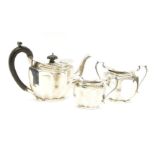 A silver three piece tea set, Birmingham 1945