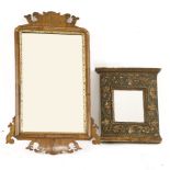A George III mahogany fret cut wall mirror, 81cm high, and a painted wood and gesso wall mirror,