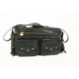 A Modalu London black leather camera-style handbag, two flap pockets and a zip pocket to the