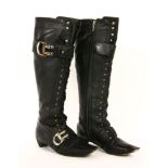 A pair of Christian Dior black calf leather knee-high boots, lace-up front with two silver-tone '