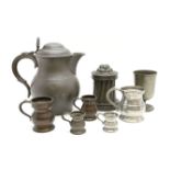 A collection of Georgian and later pewter, comprising tankards, measures and ice cream moulds,