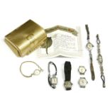 A ladies rolled gold Bulova mechanical bracelet watch, in original box, outer box and paperwork,