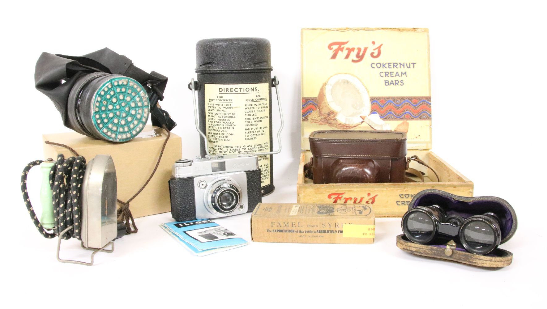 A mixed lot of collectables, to include an Ilford Sportsman 35mm camera, a respirator, a pair of