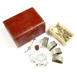 A Victorian small red jewellery box, with lock and key, together with assorted costume jewellery,