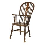 An ash, elm and beechwood high back Windsor chair, and cushionProvenance: The Collection of Mr and