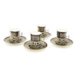 A set of four Coalport silver mounted porcelain coffee cups, London, 1908