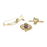 A gold peridot and split pearl bud bar brooch, marked 9ct (pin not gold), 2.83g, a gold amethyst and
