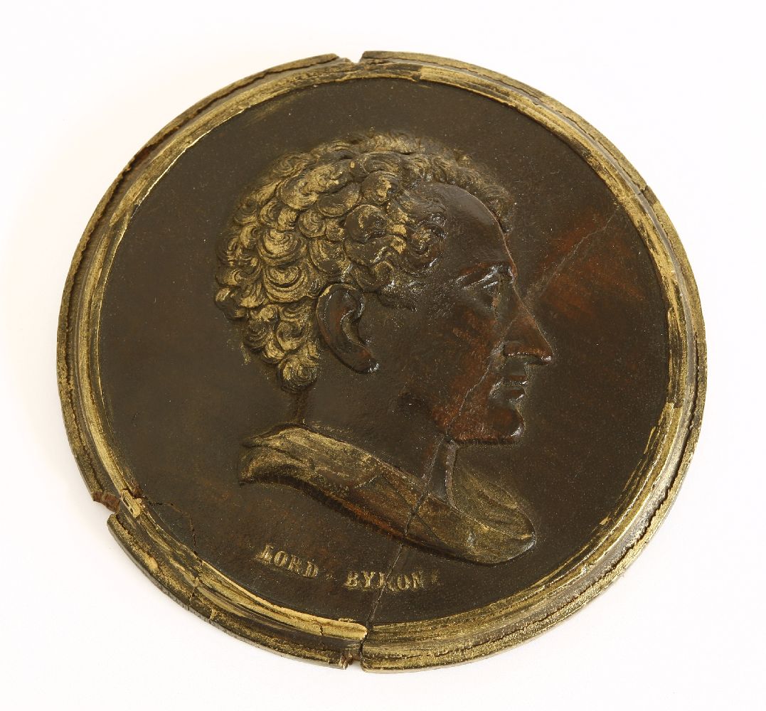 A carved oak and gilt highlighted portrait roundel of Lord Byron, mid 19th century, 13cm