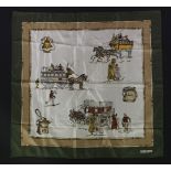 A Céline silk scarf, a cream and green ground with a printed horse and carriage design, and