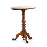 A George III mahogany fold over tea table, 82cm wide, 40cm deep, 74cm high, together with a