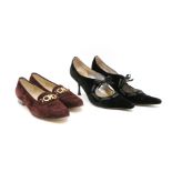 A pair of Salvatore Ferragamo black velvet heeled shoes, with grosgrain ribbon detail to the