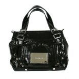 A Karen Millen black patent leather handbag, external pocket with applied silver-tone plaque