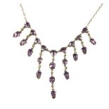 A 19th century silver amethyst and split pearl fringe necklace, with each fringe terminating in a