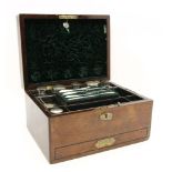 A Victorian rosewood vanity case, with a label `Made by Mecht, 4 Leadenhall Street, London', the