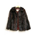 Two short fur coats, one coney dyed black, the other dark brown musquash, originally retailed by