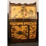 A Korean elm and lacquered bureau, 20th century, fall front, over an arrangement of drawers and