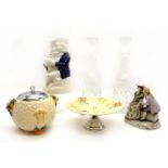 A quantity of collectibles to include Clarice Cliff ceramics, a pair of tall cut glass decanters,