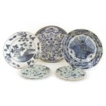 Three 18th century delft chargers, largest 35cm diameter, all with damage, a pair of Continental