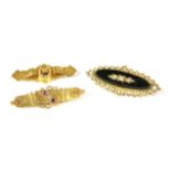 Three Victorian brooches, to include a Victorian 15ct gold three stone diamond and ruby bar