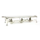 An Asprey & Co silver plated triple warming stand, of rectangular form with three spirit burners