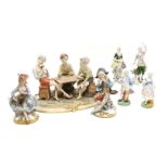 A collection of ceramic figures to include Continental examples and a large Capodimonte figure group