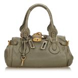 A Chloe leather Paddington handbag, featuring a leather body with gold-tone hardware and belt