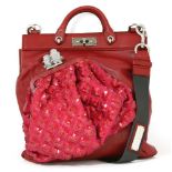 A Marc Jacobs red leather messenger 'bag on bag' handbag, featuring a pebbled red leather