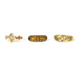 A 15ct gold five stone graduated citrine ring, size L, 2.14g, a 15ct gold three stone diamond and