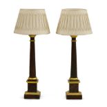 A pair of grained wood table lamps, with turned columns, plinth bases, `gilt' detail and shades (4),