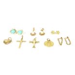 A collection of gold items, to include two 9ct gold cross pendants, a 9ct gold St Christopher, a