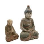 Two Chinese wood carvings of Buddha and a monk, painted with lacquer