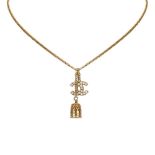 A Chanel CC Bell Charm Necklace, featuring a gold tone necklace with a diamante double C charm and