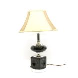 A modernist chrome and black enamelled table lamp, 54cm high