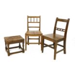 Four 19th century East Anglian elm and beechwood single dining chairs, with solid dished seats and