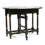 An 18th century oak gateleg dining table, on turned and block supports, 96cm wideProvenance: Riber