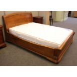 A modern cherrywood double bed, 220cm long, 172cm wide, 97cm high