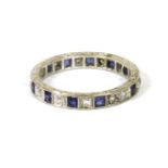 A white gold diamond and sapphire full eternity ring, size P, 3.38g