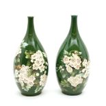 A pair of Doulton Lambeth art pottery faience vases