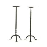 A pair of modern wrought iron pricket candlesticks in the 17th century style, 59 cm high, (2)
