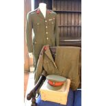 Military interest, belonging to Colonel Dennis Walton MC, an army uniform, and a dress uniform