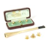 A cased 9ct gold cigarette holder, with engine turned decoration, 7.27g, three gold dress studs,