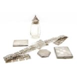 A collection of silver items, to include two cigarette cases, a compact, a silver topped glass sugar