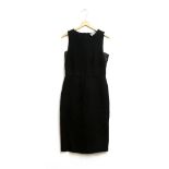 A Sportmax black knitted dress, with satin areas, size 10, a Bastyan creme top with a silver tone