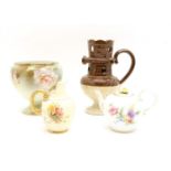 A Meissen porcelain teapot, decorated with flowers, with a rose knop, a Royal Worcester jug, a