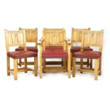 A set of six Cotswolds style oak dining chairs, comprising two elbows and four single chairs