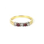 An 18ct gold diamond and ruby five stone ring, size Q½, 3.56g