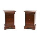 A pair of modern mahogany bedside cupboards, 71cm high (2)