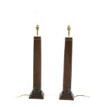 A pair of large modern wooden table lamps with fluted stems on stepped bases, 77cm high